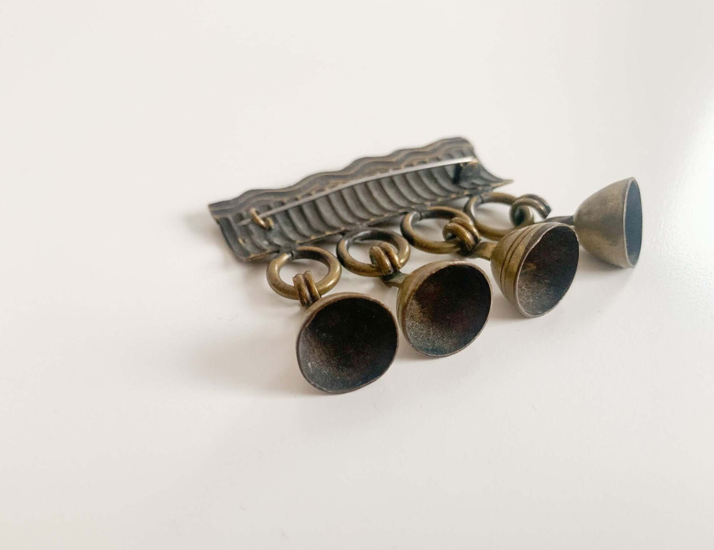 Rare modernist bronze brooch with charms Kalevala Koru, Solki-921