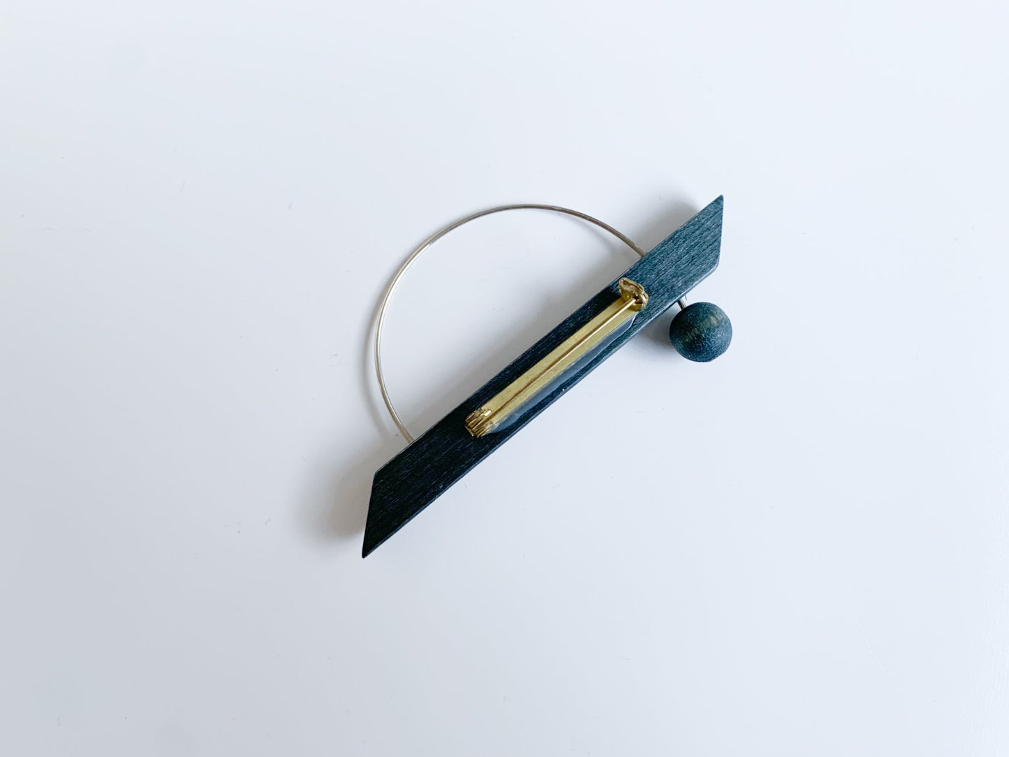 Wooden stylish black brooch by Aarikka Finland