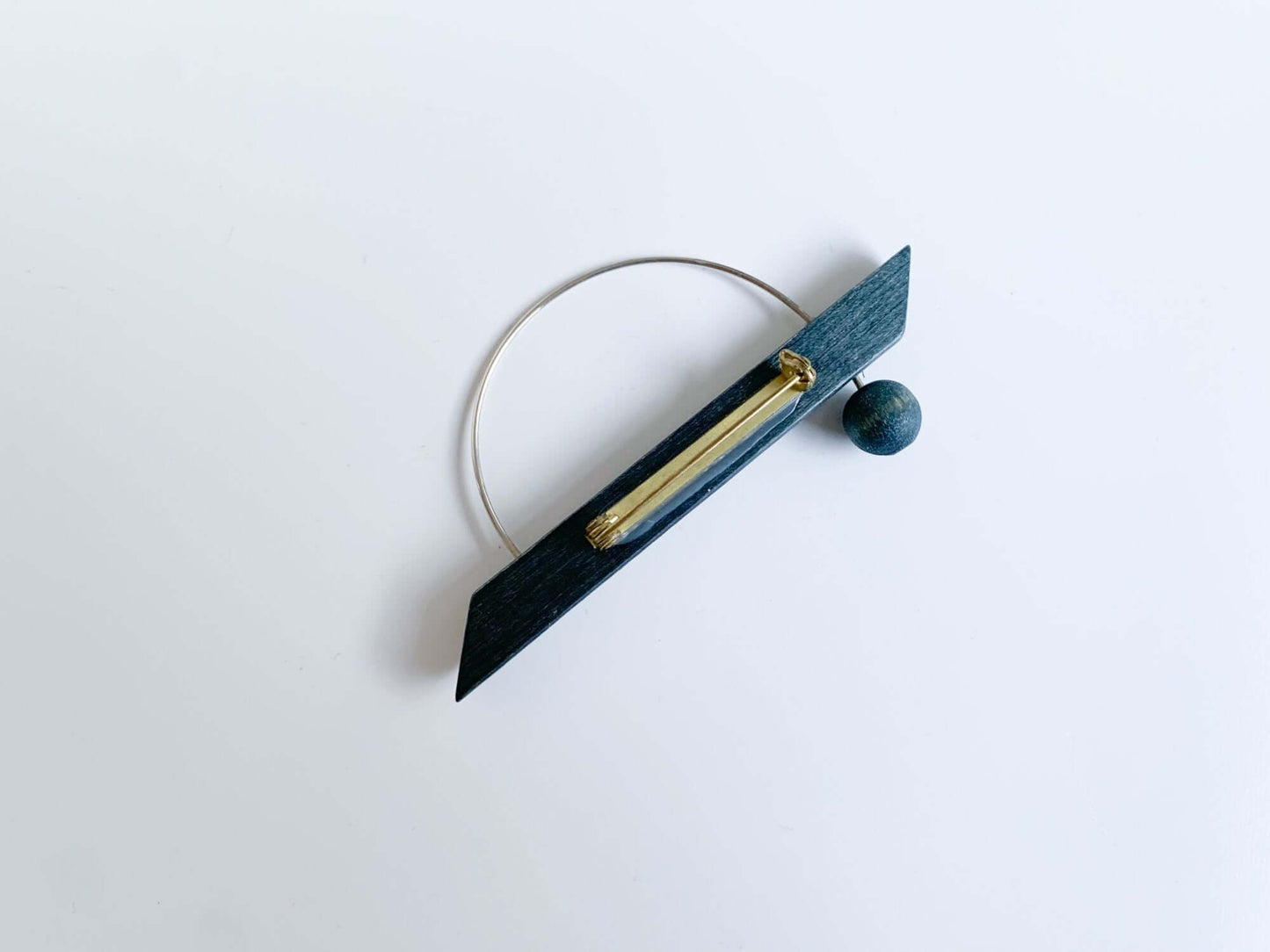 Wooden stylish black brooch by Aarikka Finland