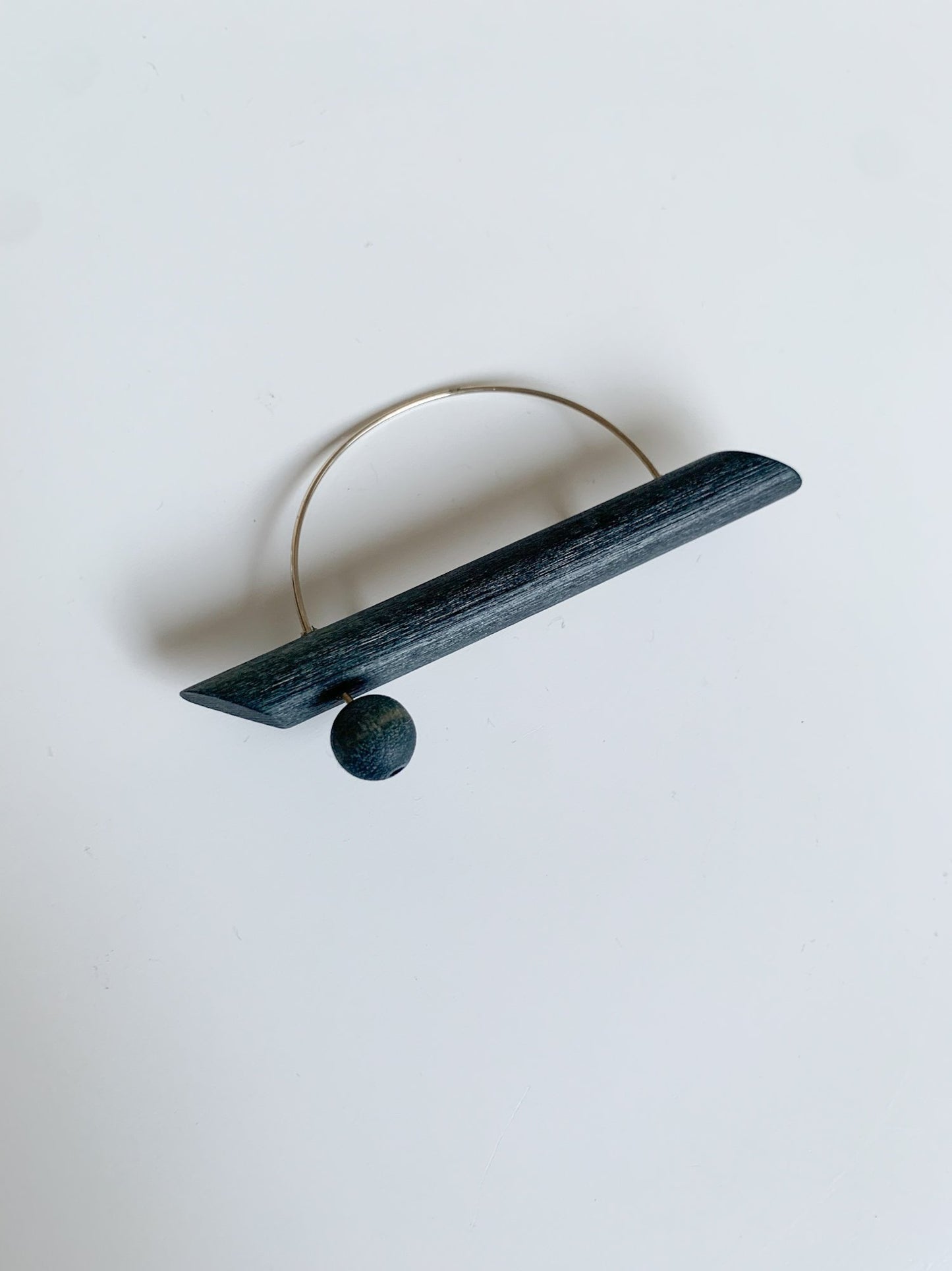 Wooden stylish black brooch by Aarikka Finland
