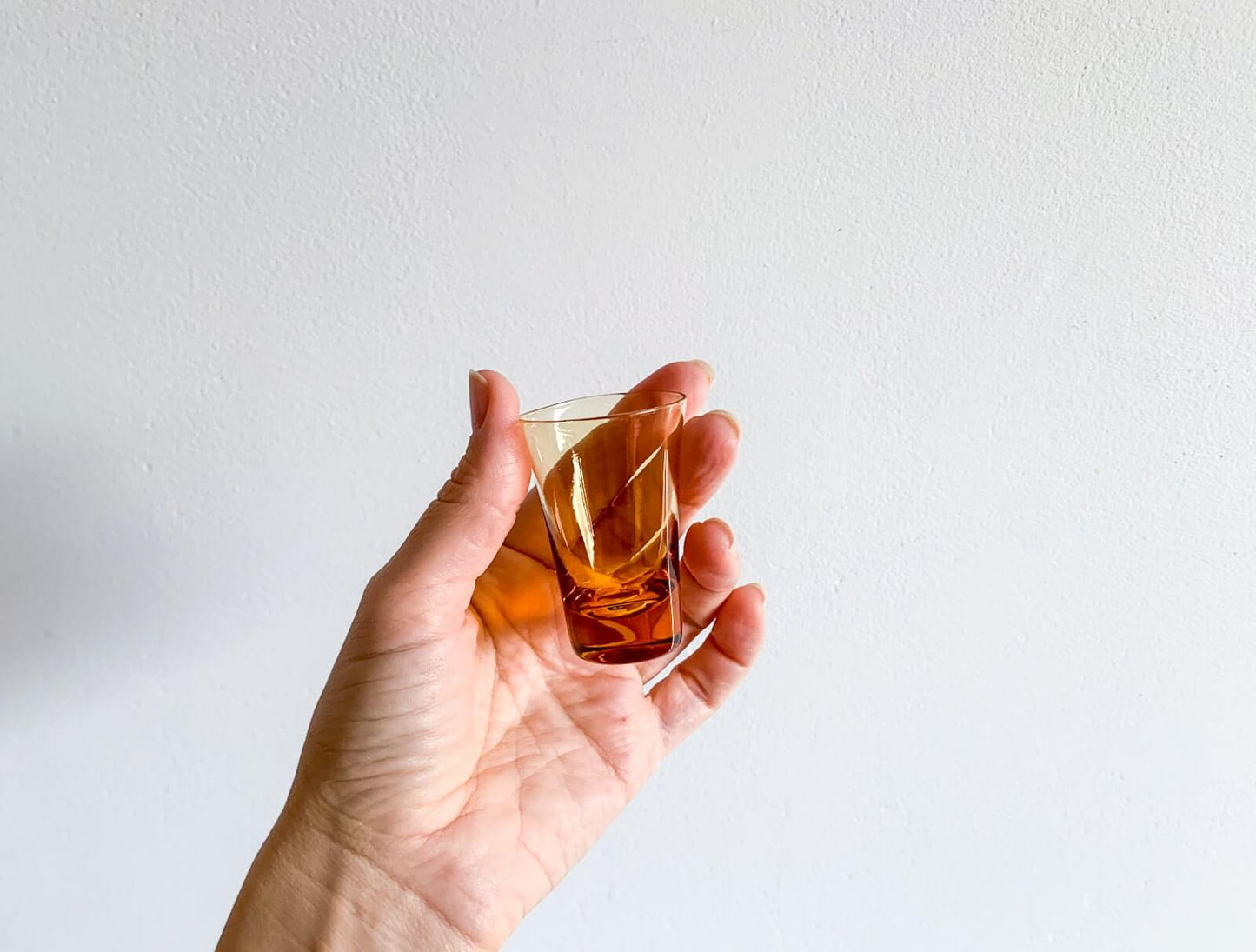 Set of vintage shot glasses in multicolored glass