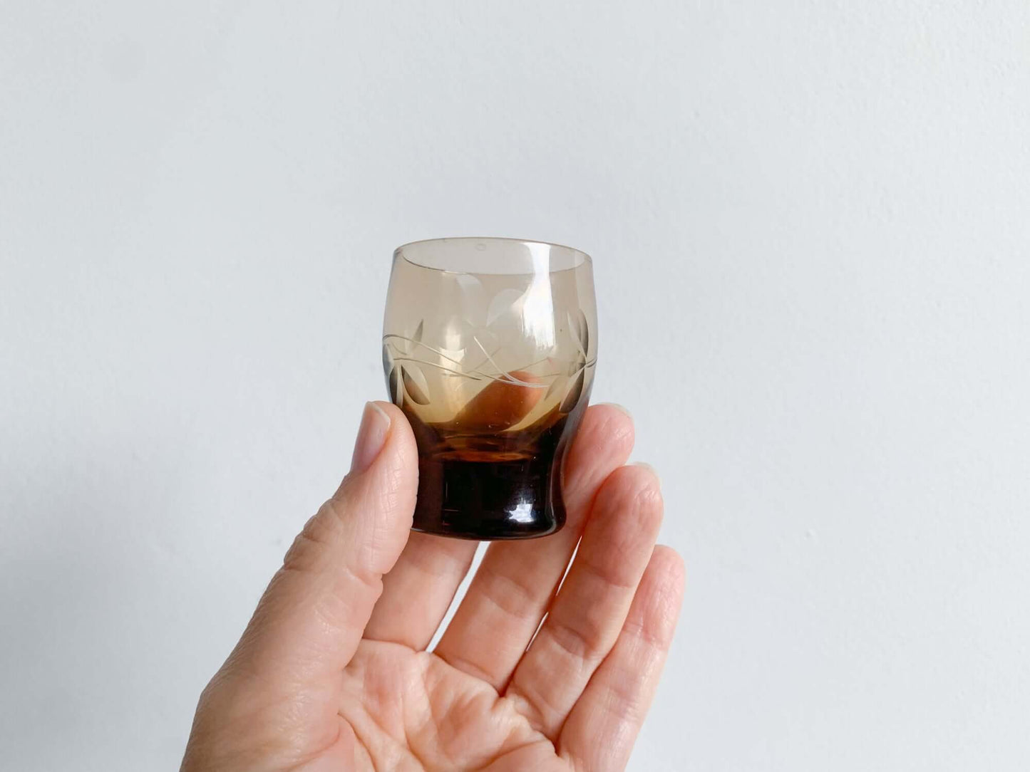 Trio of engraved shot glasses, designer Ilmari Kumela, 1950s Finland