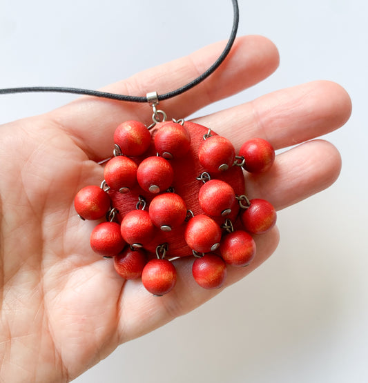 Aarikka Finland | Rare wooden pendant with cranberry red beads