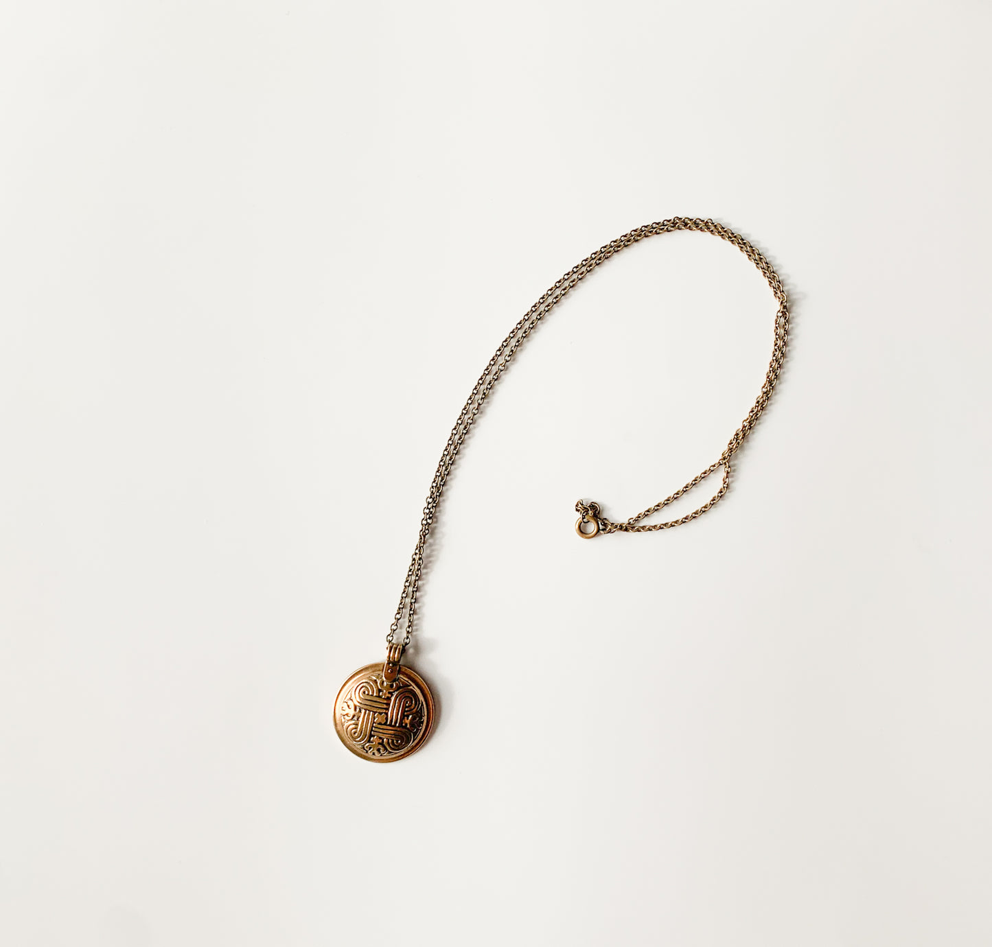 Kalevala Koru, Bronze pendant Hannunvaakuna