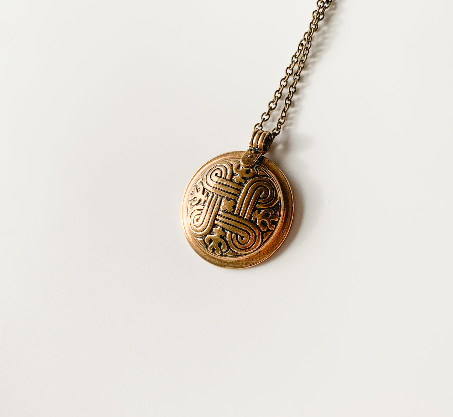 Kalevala Koru, Bronze pendant Hannunvaakuna