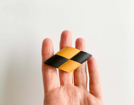 Vintage black and wood colored brooch by Aarikka Finland