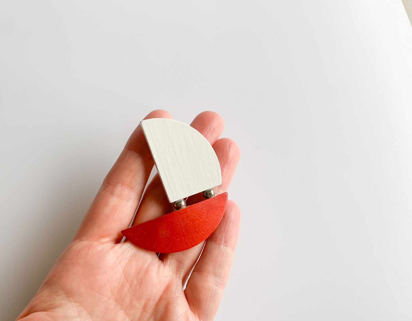Red and white wooden brooch Sailboat by Aarikka, Finland
