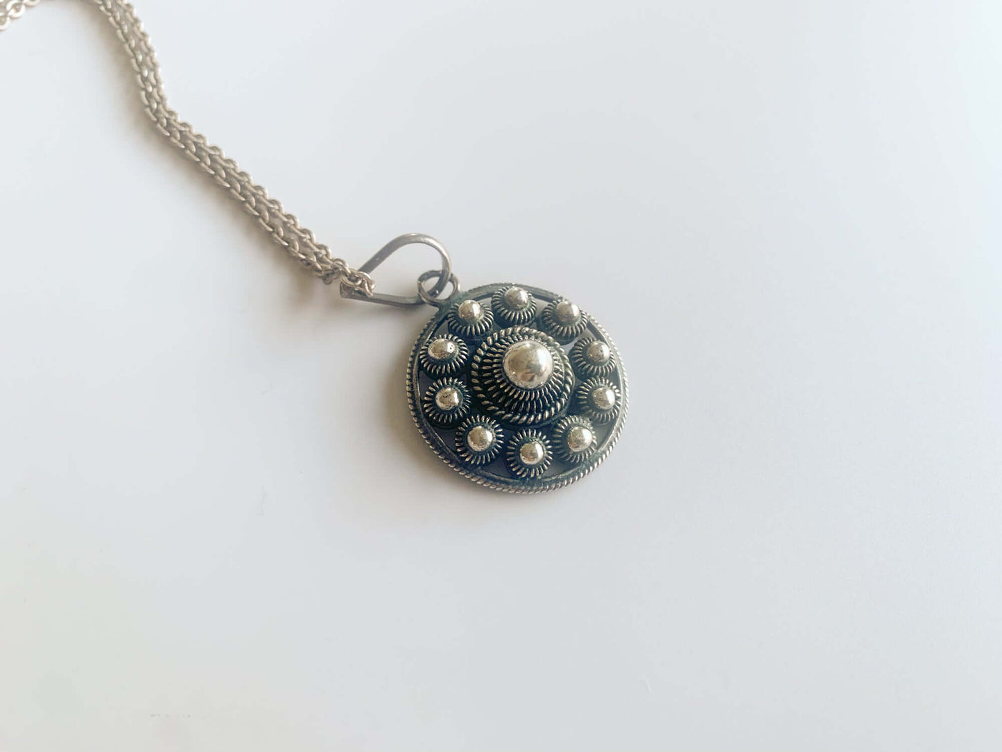 Silver Dutch Button pendant, filigree technique