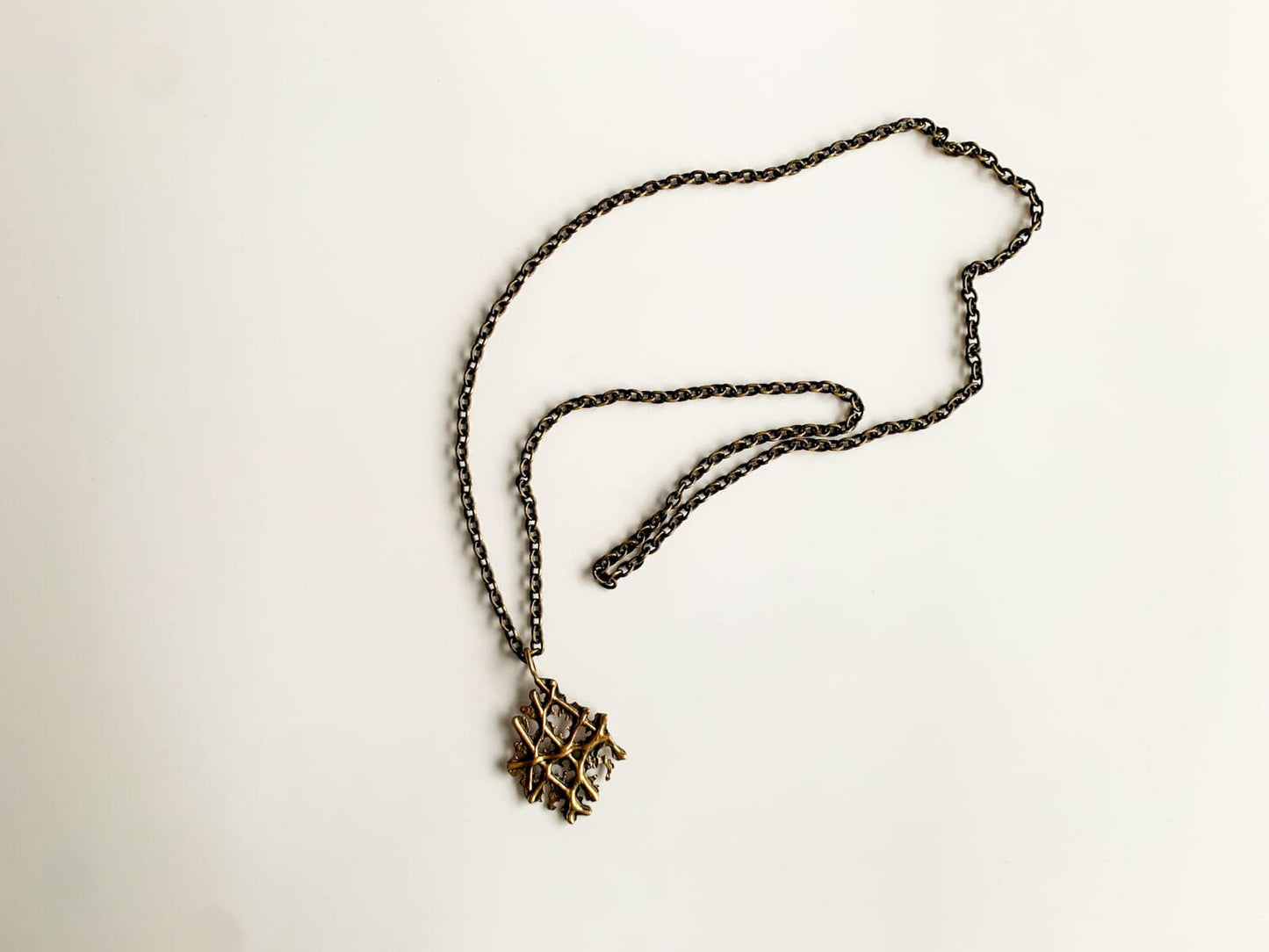 Modernist Bronze Pendant Crossed Branches, 1970s Finland