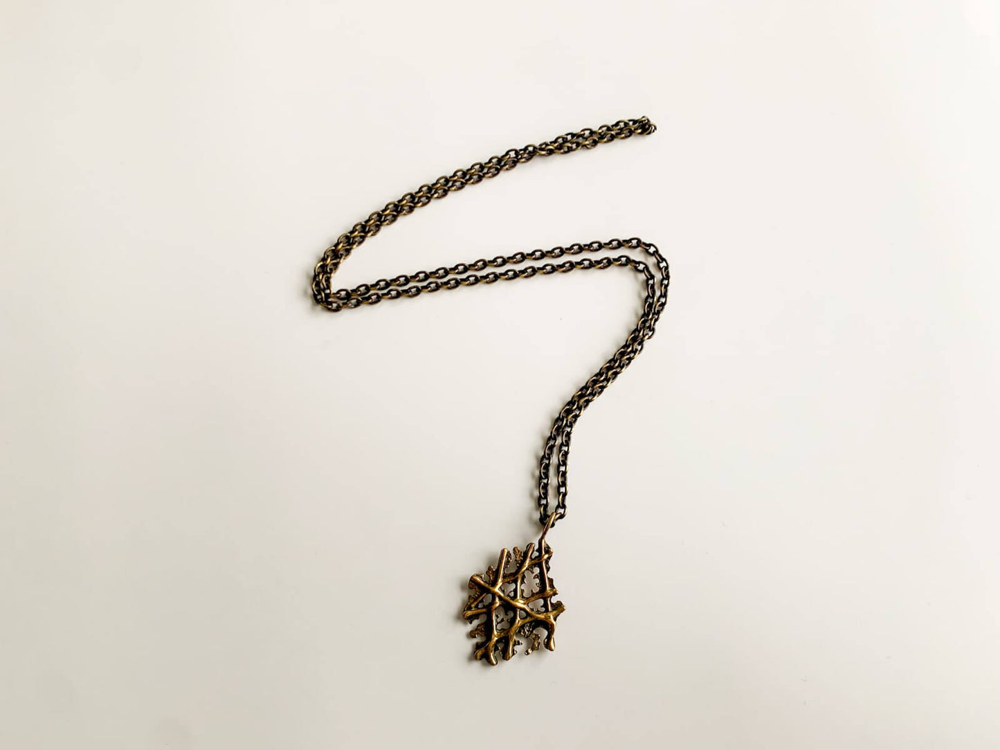 Modernist Bronze Pendant Crossed Branches, 1970s Finland