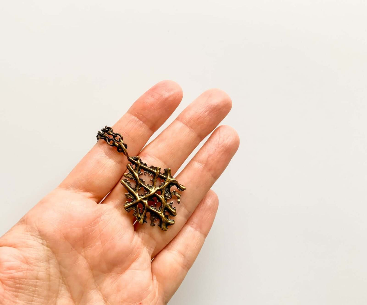 Modernist Bronze Pendant Crossed Branches, 1970s Finland