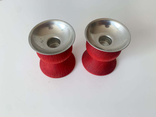 Pair of red wooden candle holders, Aarikka, Finland, 1970s