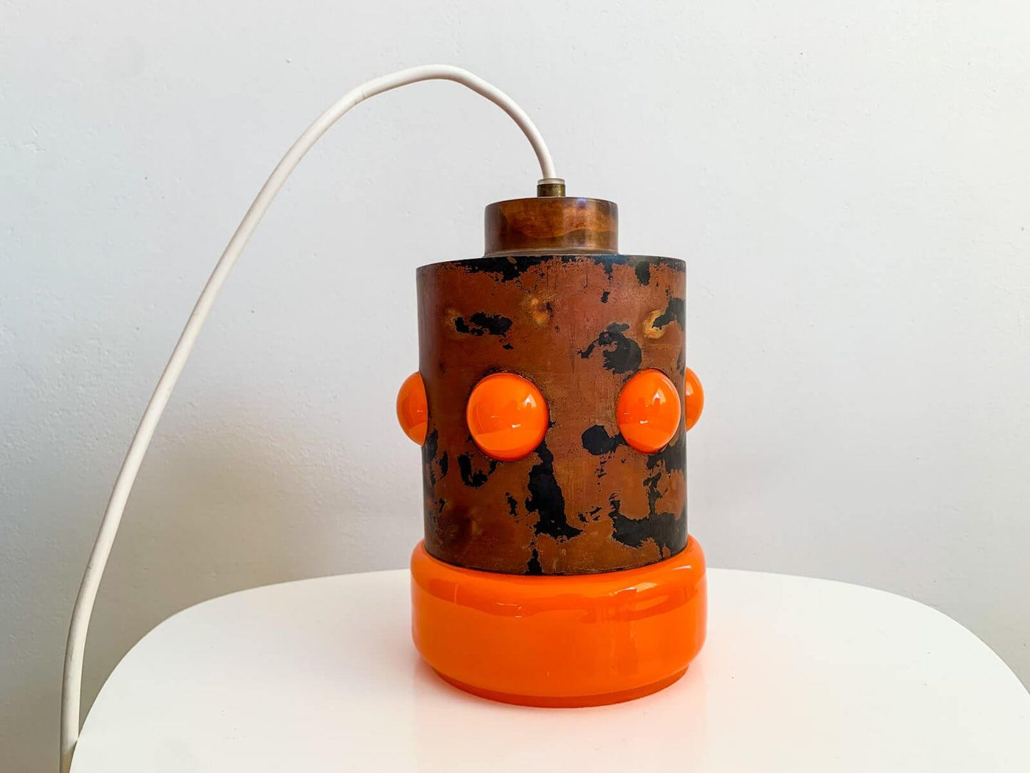 Vintage pendant lamp in Scandinavian style | Orange glass and copper