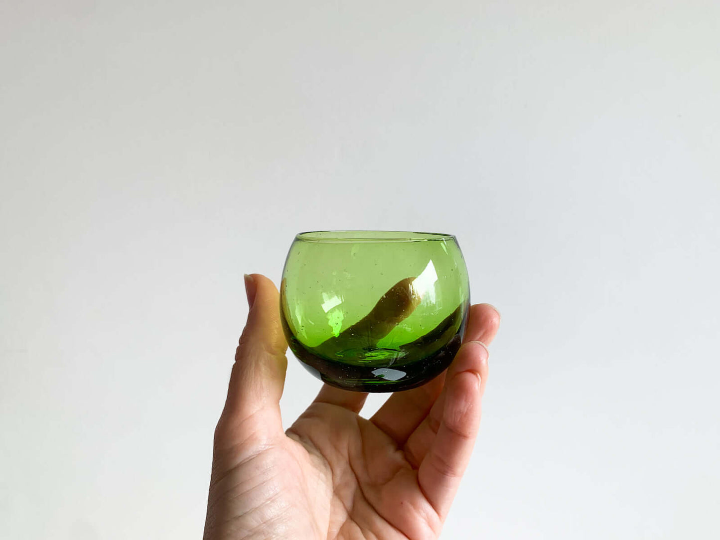 Green glass with bubbles