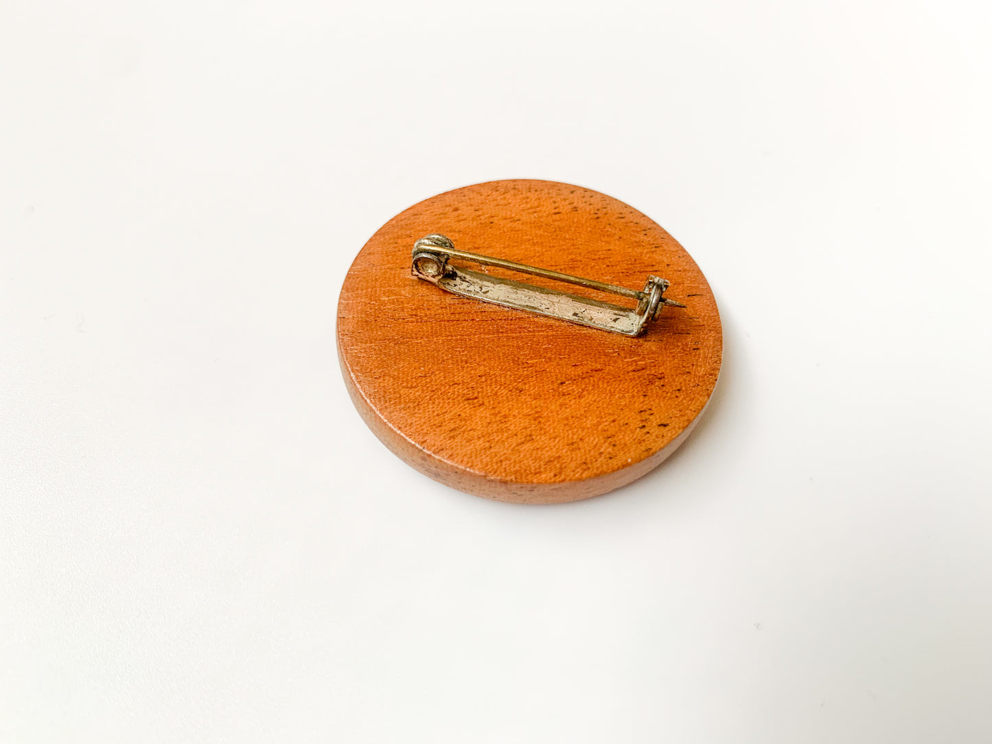Modernist wood brooch with metal dots 1960s