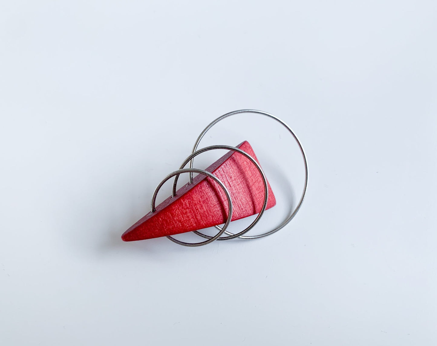 Wooden stylish red triangle brooch by Aarikka Finland