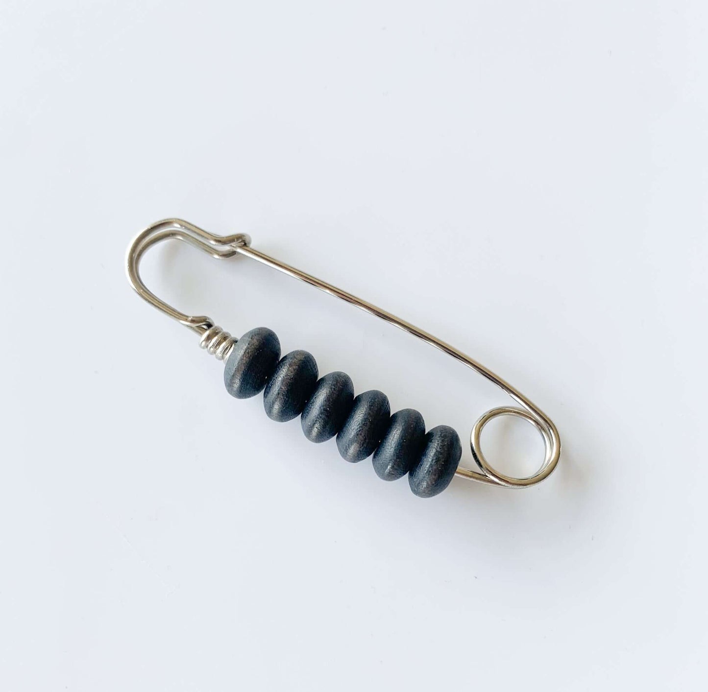 Aarikka Finland | Safety pinb brooch wooden black beads | Molna Vintage