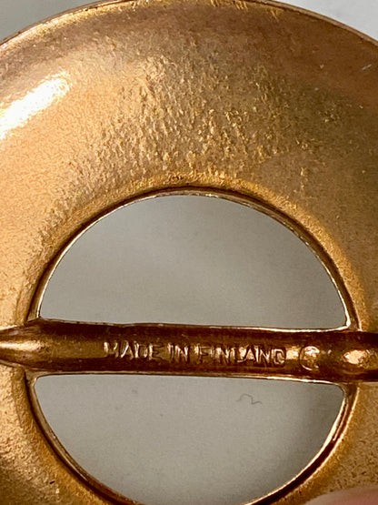 Circular bronze brooch by Kalevala