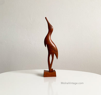 Teak heron figurine