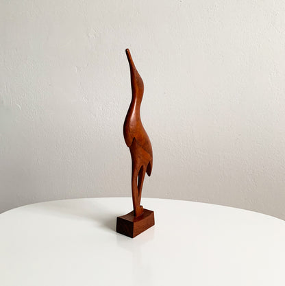 Teak heron figurine