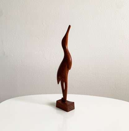 Teak heron figurine