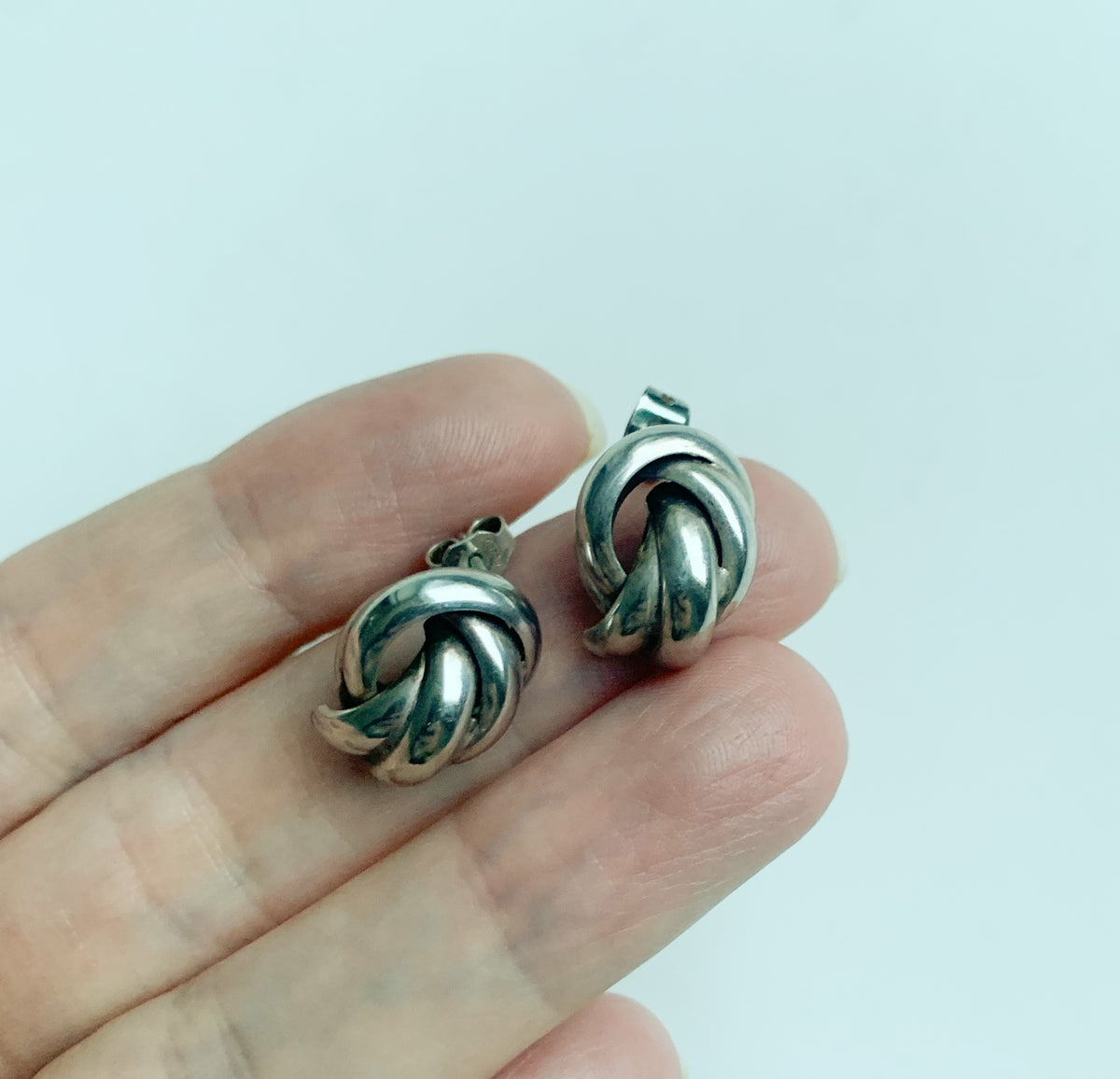 Silver love knot earrings