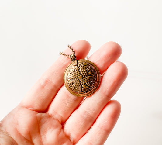 Kalevala Koru, Bronze pendant Hannunvaakuna