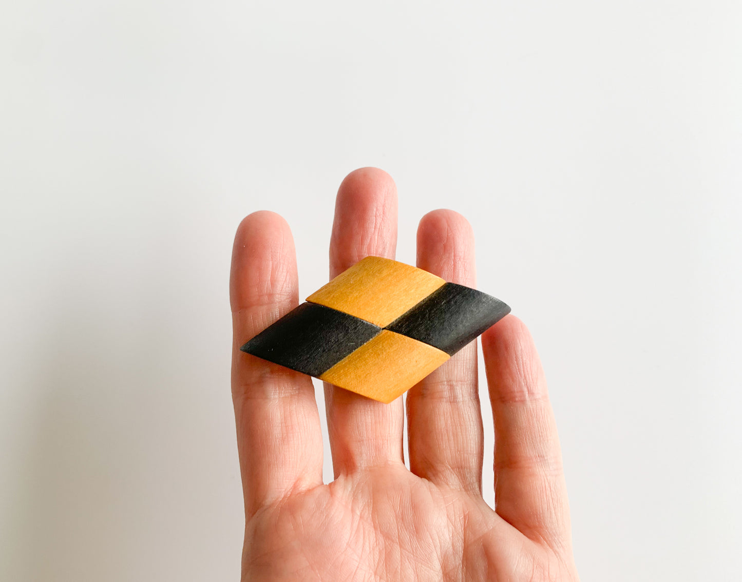 Vintage black and wood colored brooch by Aarikka Finland
