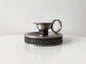 vintage tin Brutalist Viking style candle holder