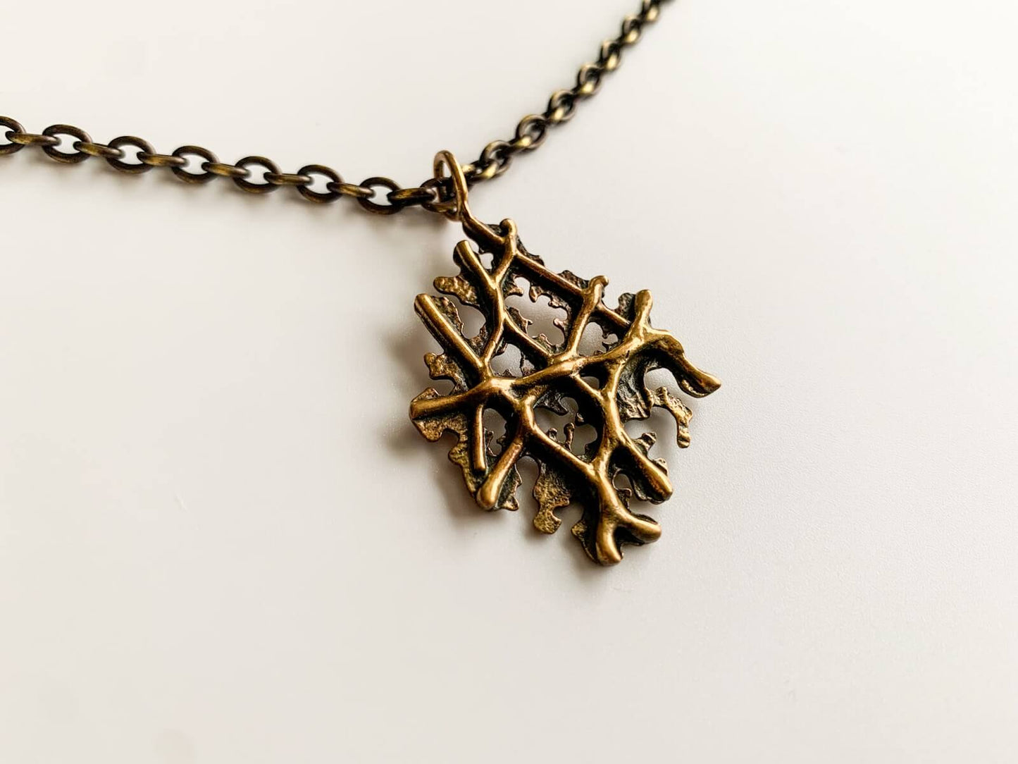 Modernist Bronze Pendant Crossed Branches, 1970s Finland