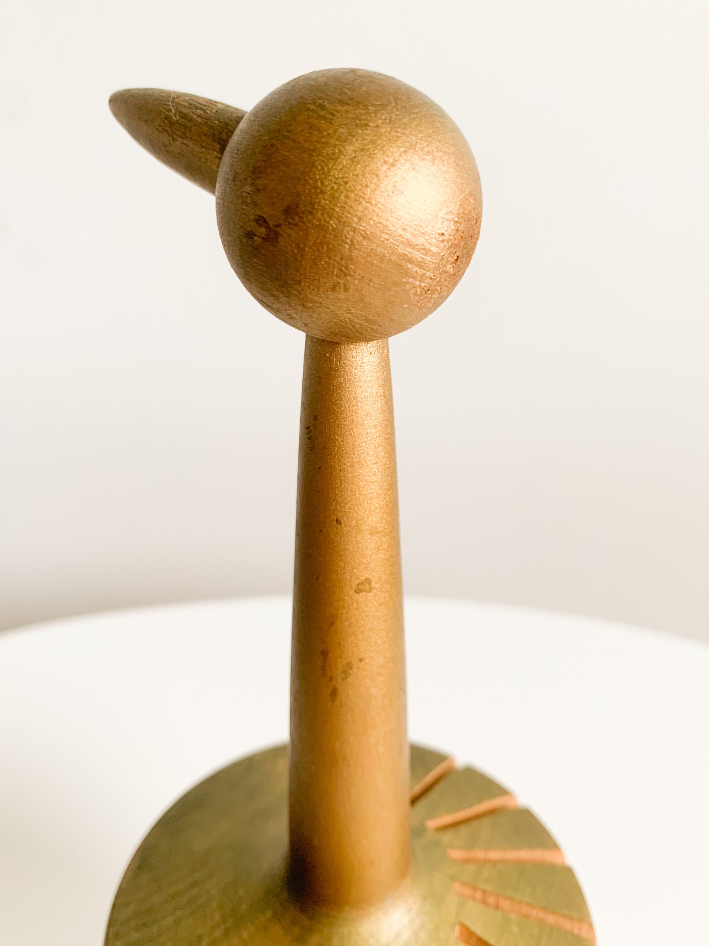 Paavo Asikainen | Wooden golden tone bird figurine