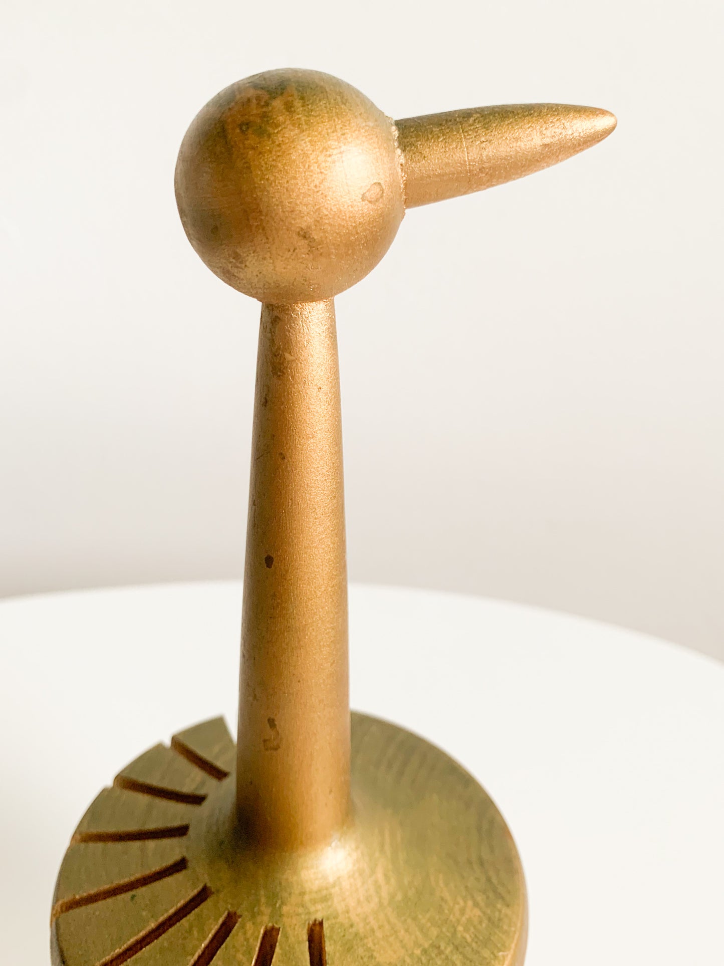 Paavo Asikainen | Wooden golden tone bird figurine