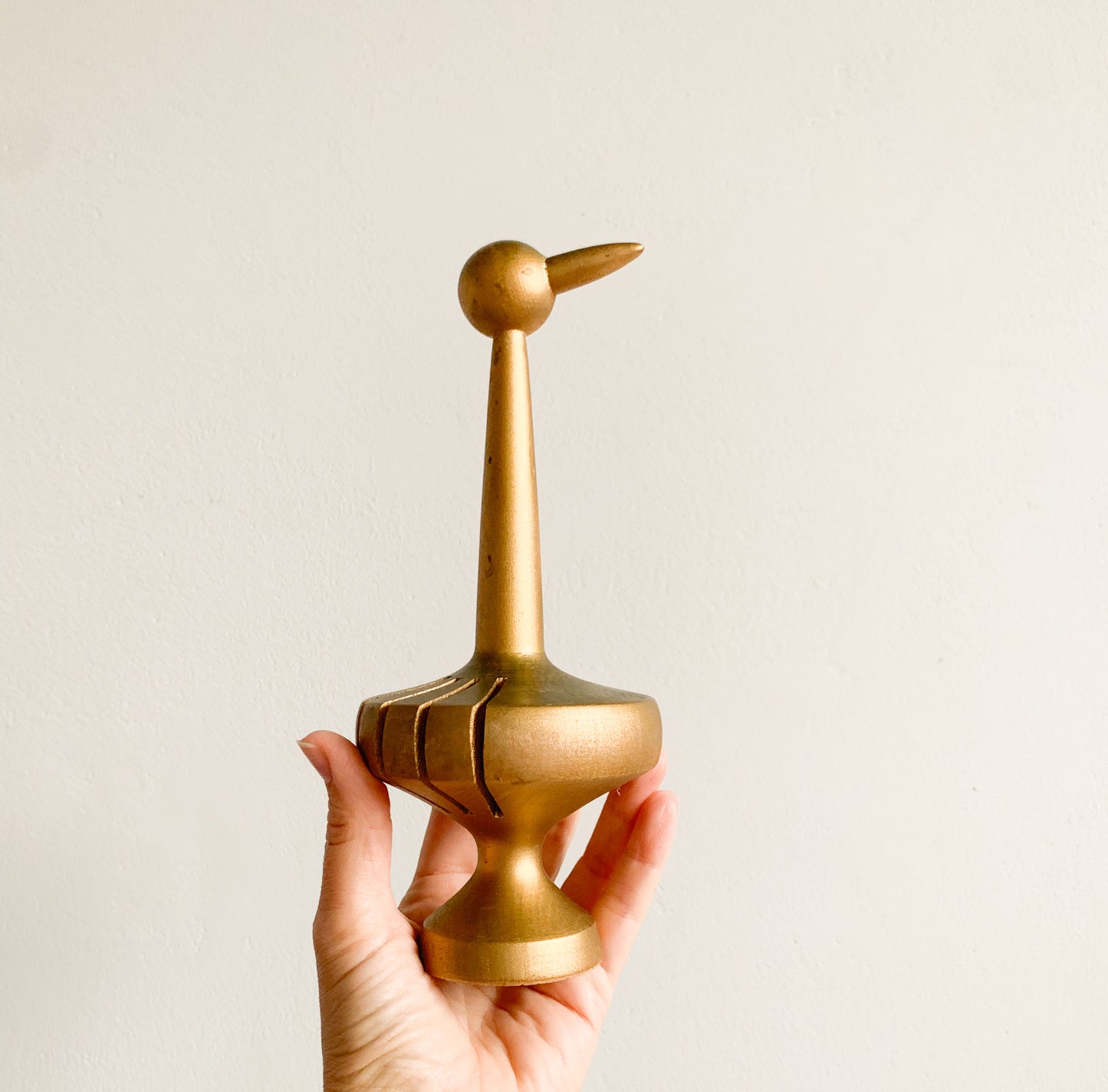 Paavo Asikainen | Wooden golden tone bird figurine