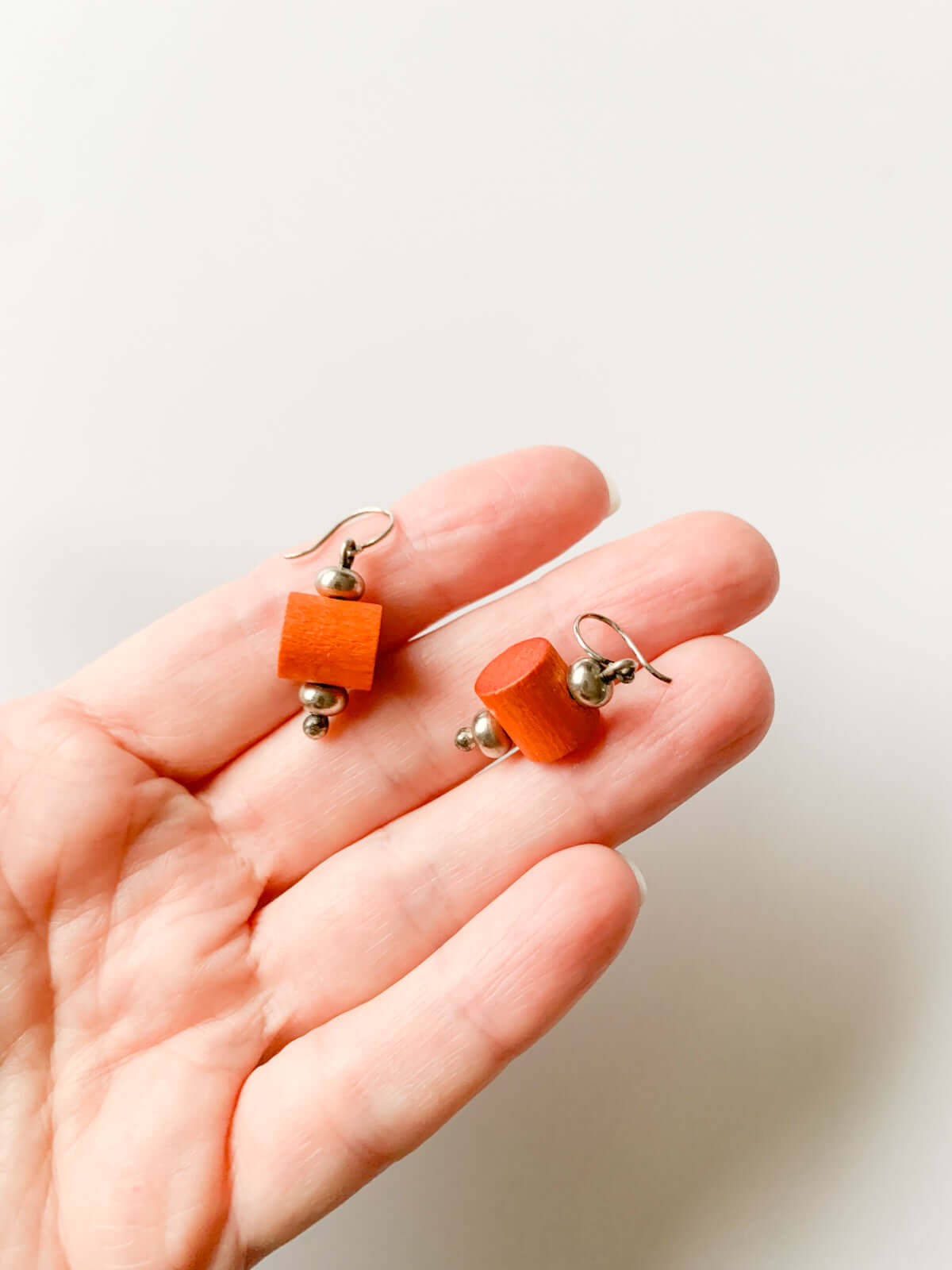 Aarikka Finland, cylindrical wooden bead earrings, orange