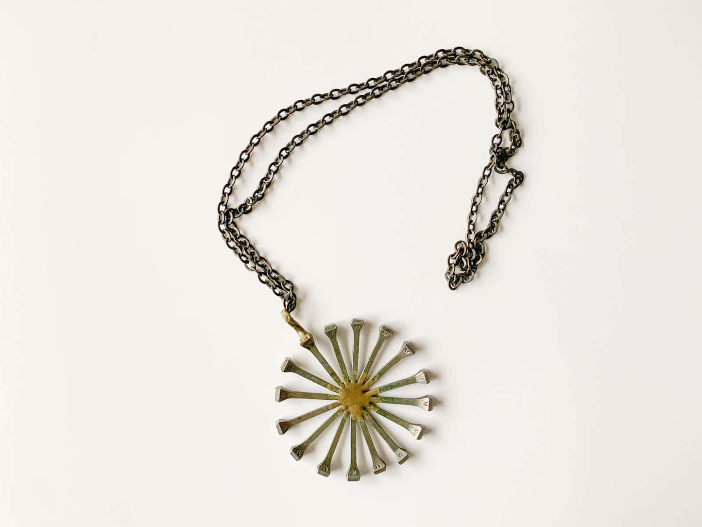 Brutalist Horseshoe Nail Pendant Necklace