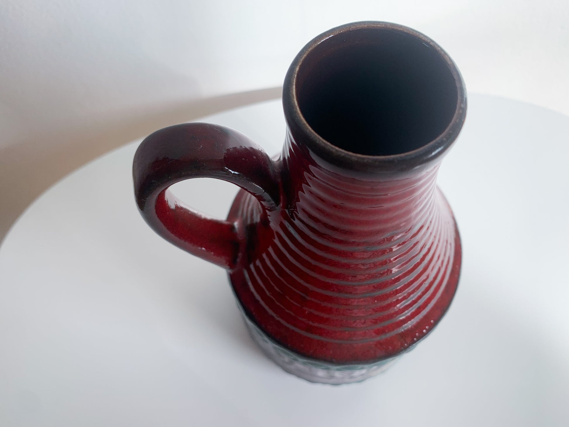 German pottery of 1970s. Ceramic vase in green and red, Strehla, Germany