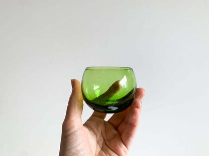 Green glass with bubbles