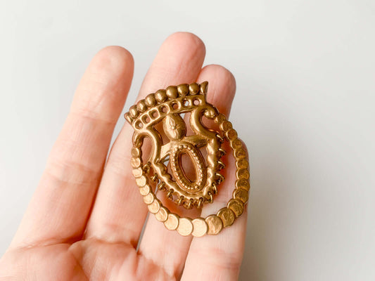 Kalevala Koru, Solki 167 Ylistaro bronze brooch