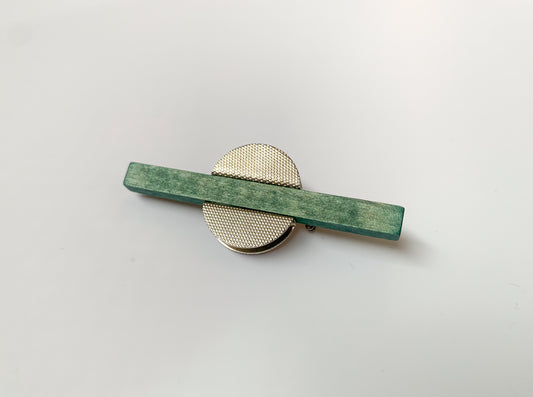 Green wood and metal brooch by Aarikka Finland