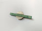 Green wood and metal brooch by Aarikka Finland